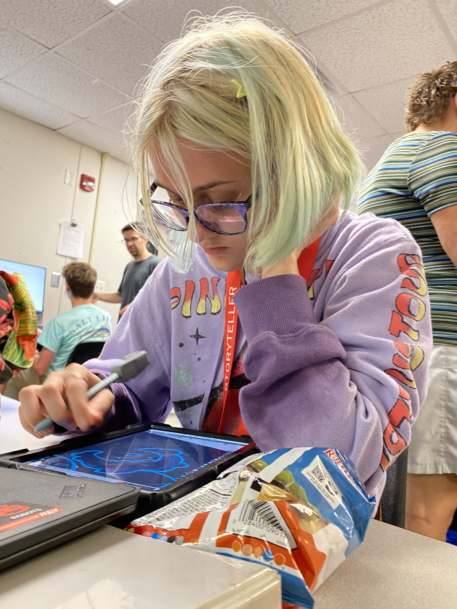 Students reviewing CAD drawings