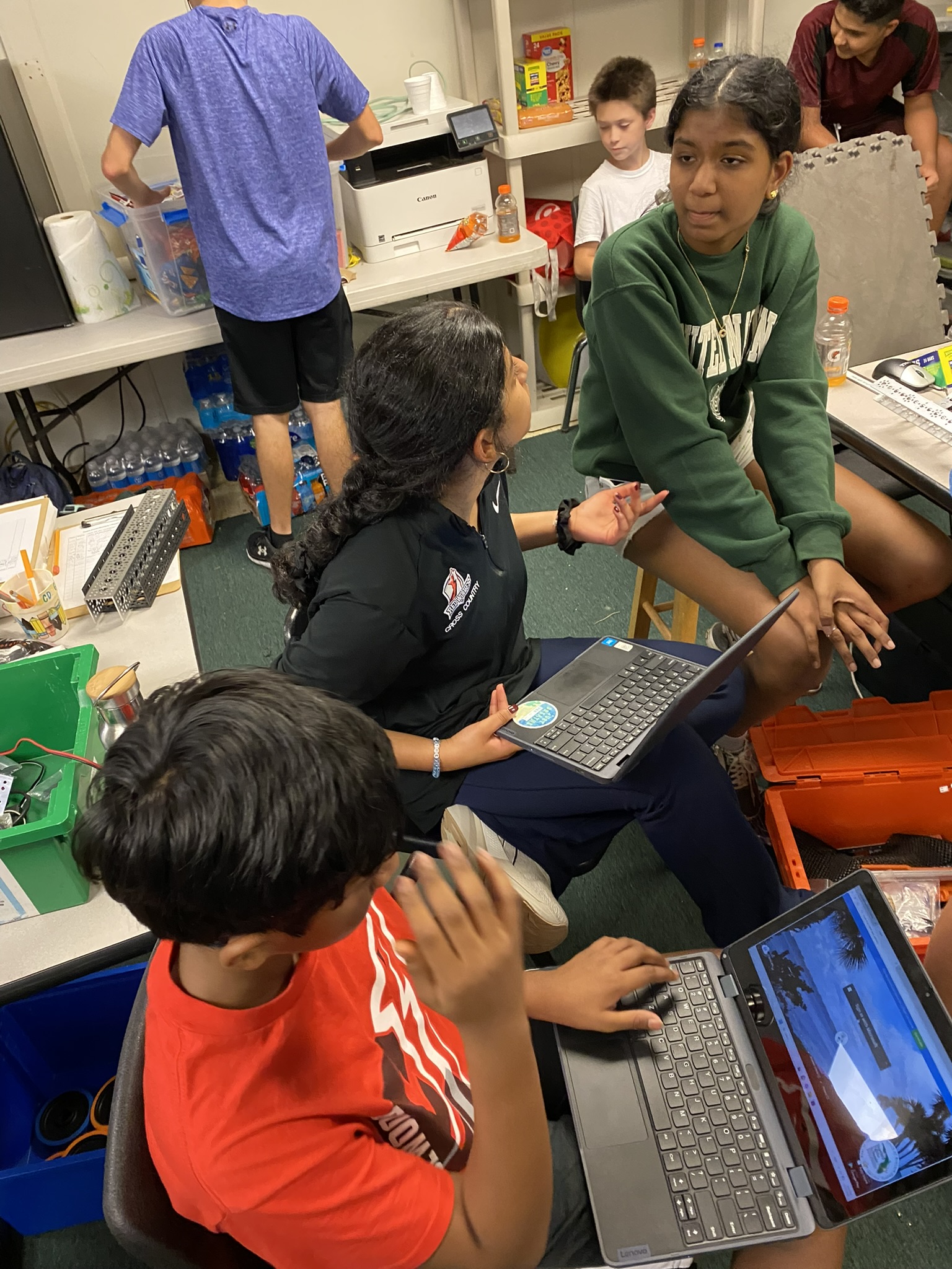 Coach explaining strategy to the team