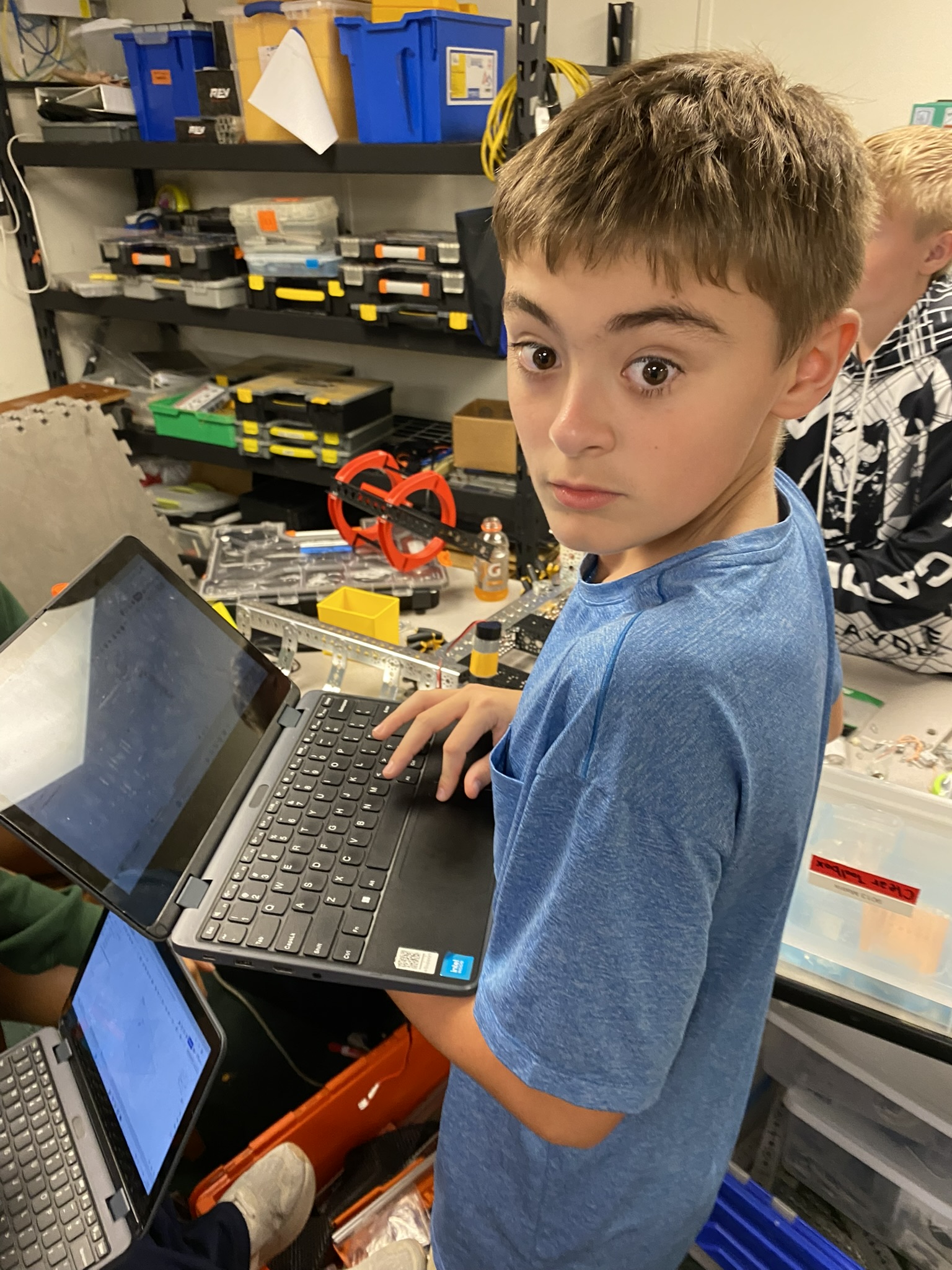 Team working on programming station